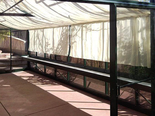 Shades on the roof of a greenhouse