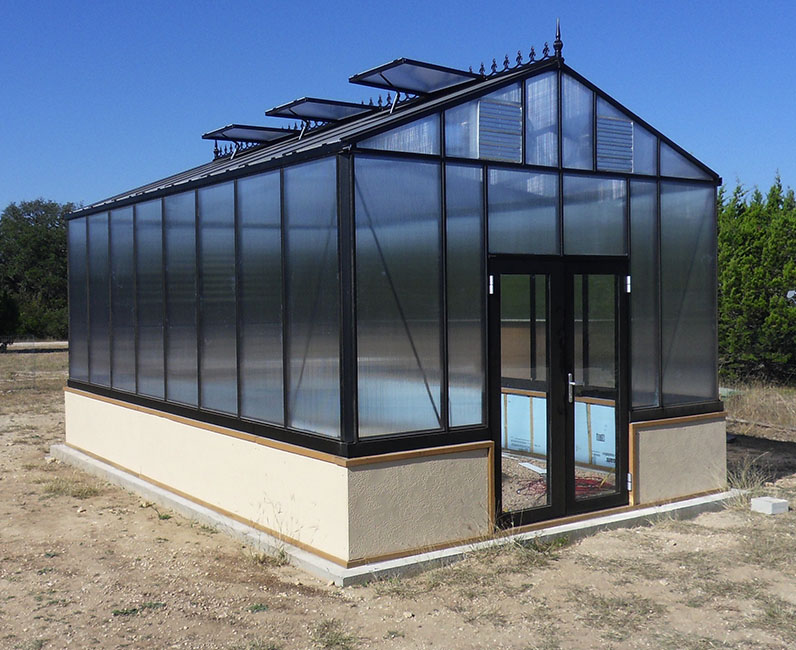A double-hinged greenhouse door kit for Victorian greenhouses