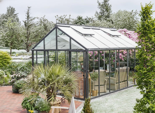 A Hoklartherm greenhouse with reinforced glass panels designed for reliable winter growing.