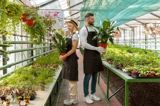 A couple checking their plants