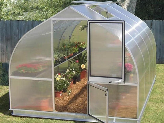 A Riga greenhouse with the front door for ventilation