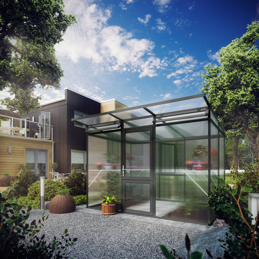 Hoklartherm Linea II greenhouse with sleek anthracite frame and mono-pitch roof in a contemporary backyard