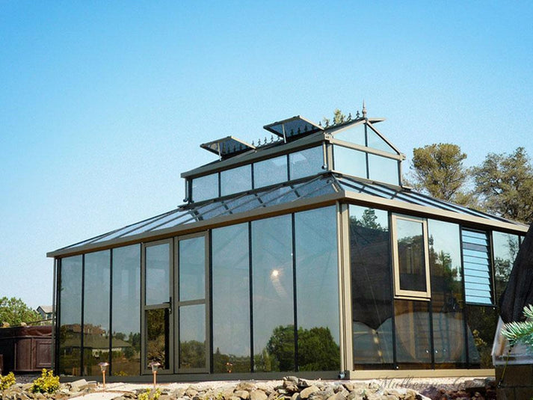 Janssens Cathedral Victorian Orangerie Greenhouse with dramatic central cupola, bronze frame, and four automatic roof vents