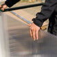 Close-up of a Hoklartherm multi-wall polycarbonate panel being fitted into the aluminum frame