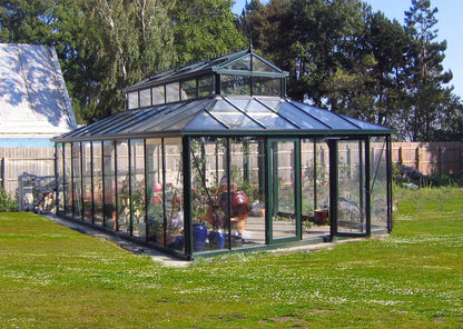 Black Janssens Cathedral Victorian Orangerie 15x20 glass greenhouse on a lawn