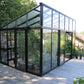 Janssens Modern greenhouse with sliding doors on a patio (10x15 M34 shown)