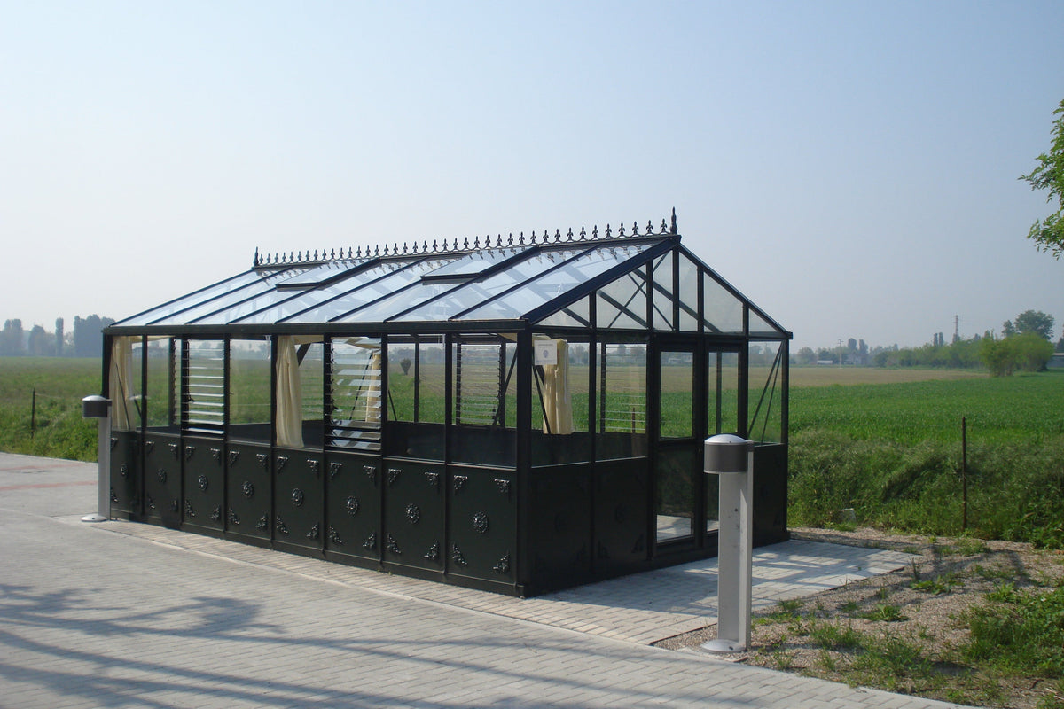 Larger model shown – black Retro Royal Victorian greenhouse on a gravel base