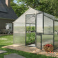 Nelke 4 Pro polycarbonate greenhouse on a wooden deck beside a brick house and apple tree