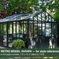 Black Janssens Retro Victorian glass greenhouse in a landscaped garden – larger Retro model shown for style reference; the Retro 23 is 7'9" x 10'2"
