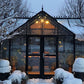 Janssens T-Shaped Royal Victorian Orangerie glowing in winter snow
